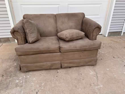 Photo of free Brown Loveseat (K-10 and Kill Creek Rd.) #1