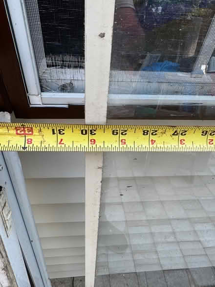 Photo of free Storm door glass insert (Latham) #1