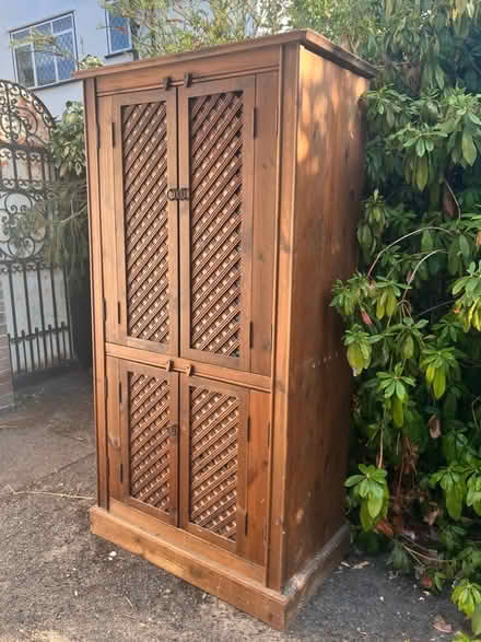 Photo of free Tall wooden cupboard (Beckenham BR3) #1