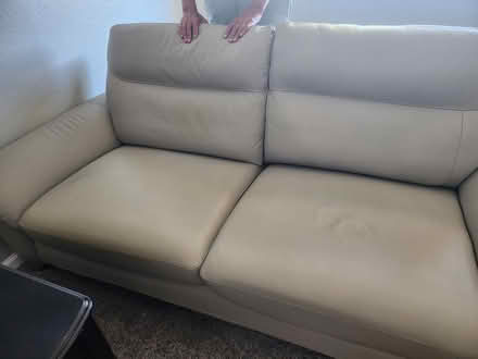 Photo of free UPDATED! Used Gray Leather Sofa (North Reno by Melody Lane Park) #1