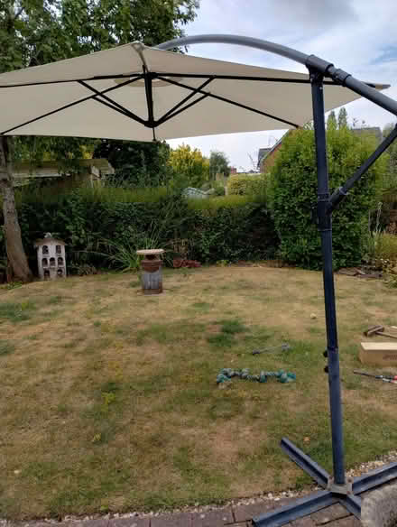 Photo of free Outdoor umbrella and base. (Madley HR2) #1