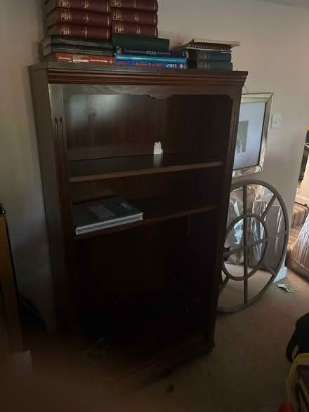 Photo of free Bookcase needs love and care (Sn14 8lb) #1