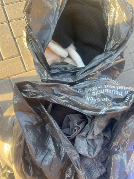 Photo of free 2 bin bags full of clothes (TW19) #1