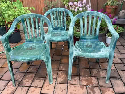 Photo of free Plastic yard chairs (3) (200th block off 13Th St SE) #1