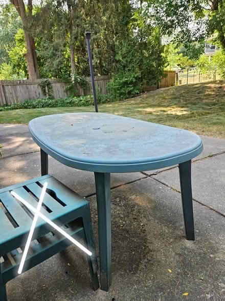Photo of free Plastic outdoor patio table (west side of Madison, WI) #1