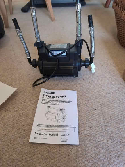Photo of free Shower pump. 1 month old (Plymtree, Norman's Green End) #1