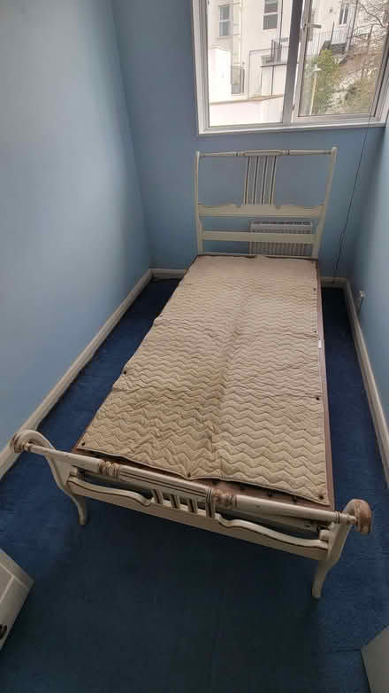 Photo of free Single Bed-Vintage wood and STAPLES sprung base (Northcote Road SW11) #1