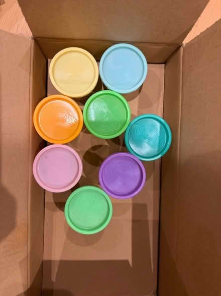 Photo of free 26 small tubs of play doh (Heaton Moor SK4) #1