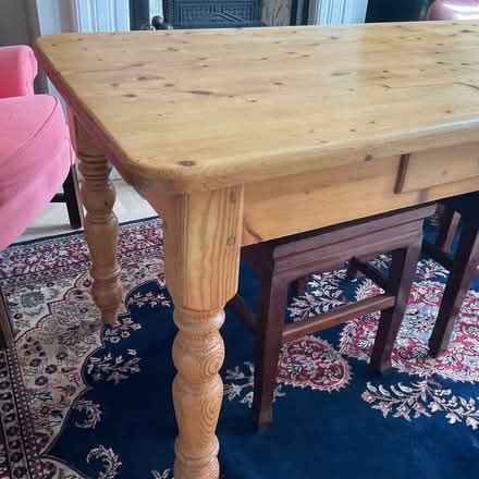 Photo of free Pine table and 2 wheel back chairs (Putney SW15) #1