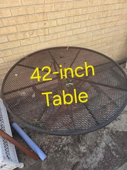 Photo of free 42-Inch diameter round metal table (Elmhurst near Berens Park) #1