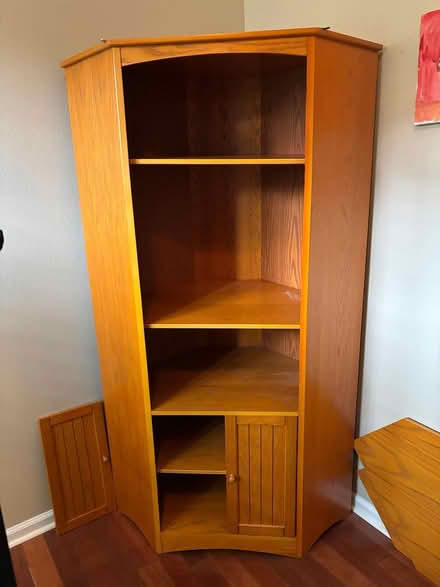 Photo of free Corner Bookcase (Lake Mary FL) #1