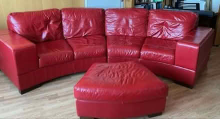 Photo of free Large red leather-effect sofa and pouffe (Western Harbour EH6) #2