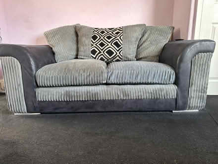 Photo of free Black and grey sofa with silver feet (Farington PR25) #1