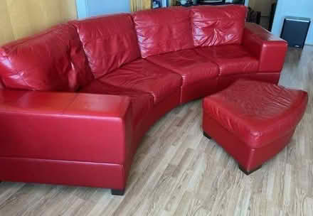 Photo of free Large red leather-effect sofa and pouffe (Western Harbour EH6) #3