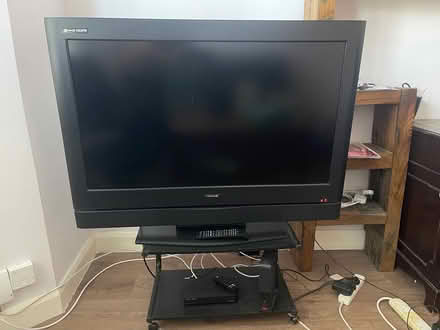 Photo of free Tv + remote control & stand (E15 4HJ, Stratford, Newham.) #1