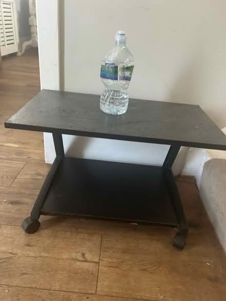 Photo of free Small black Tv stand on wheels (Pennhill BH14) #1