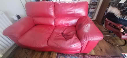 Photo of free Red leather two seater sofa. (Alexandra Park N22) #1