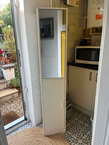 Photo of free Tall, slim, bathroom cabinet, half mirrored, with 6 shelves (Kings Langley WD4) #1