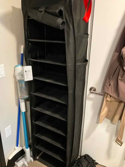 Photo of free Shoe rack w/ dust cover til Aug. 4 (noma) #1