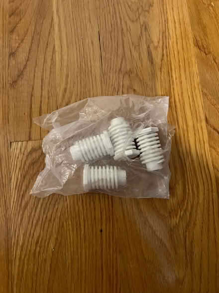 Photo of free Set of washer/dryer “feet” (Porter Square) #1