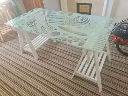 Photo of free Ikea Glasholm glass topped table / desk with x 2 trestles (Hassocks BN6) #1
