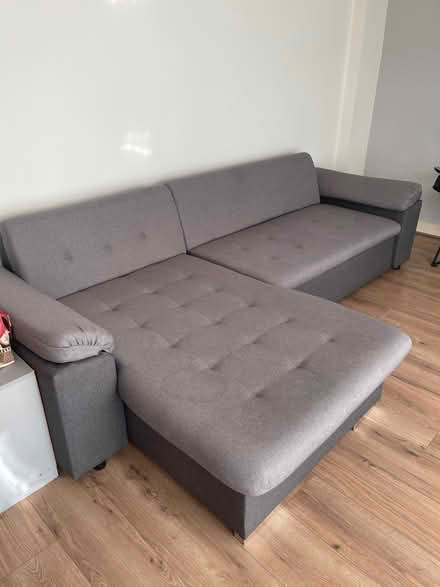 Photo of free L shaped grey sofa bed (Crumpsall Green M9) #1