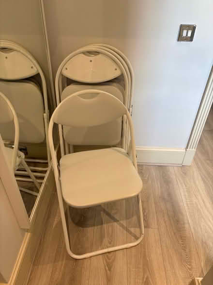 Photo of free 5x foldable white chairs (Chelsea SW3) #1