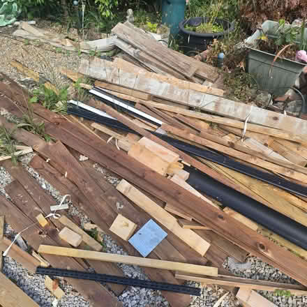 Photo of free Timber off cuts, 18mm ply board, log lap treated wood (Moss Side PR26) #1