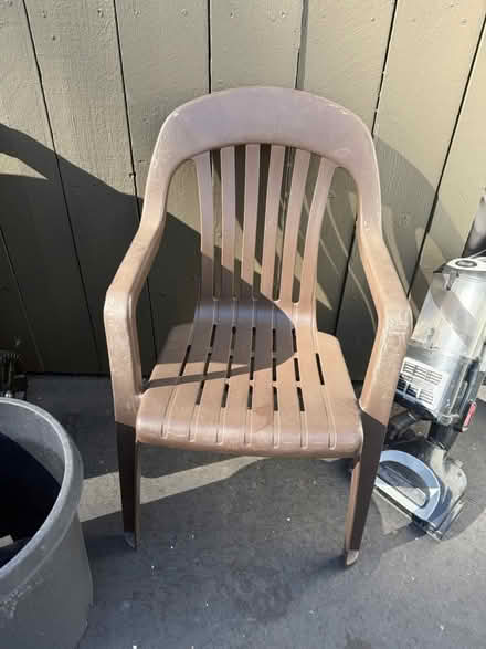 Photo of free Plastic armchair (1075 Valencia Avenue) #1