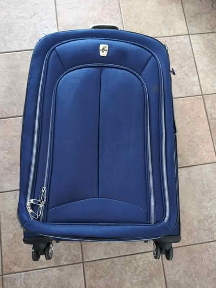 Photo of free Blue full size suitcase (North West Brampton) #1