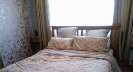 Photo of free 90 x 90 gold eyelet curtains (Grangeway area NN10) #1