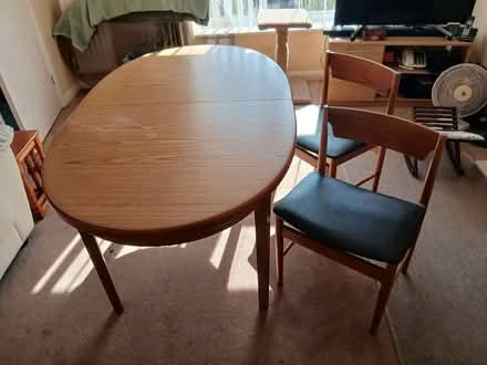 Photo of free Oval wooden dining table (Lowton. Nr. Wigan WA3) #1