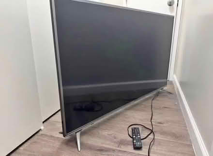 Photo of free Large flat screen TV with remote (Acton W3) #1