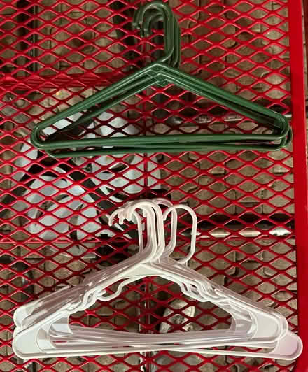 Photo of free Plastic tubular clothes hangers (1075 Valencia Avenue) #1