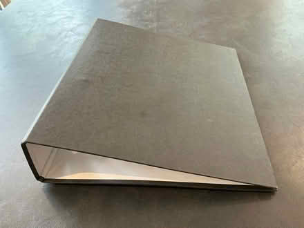 Photo of free A black lever-arch reinforced cardboard A4 file/binder (New Malden KT3) #1