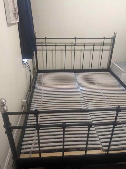 Photo of free Black metal queen bed frame (02130) #1
