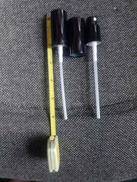 Photo of free Metal tins, bottle sprayers (Downtown Bartlett) #2