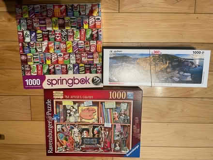 Photo of free 3 - 1,000 piece puzzles (Ossington and Dupont) #1