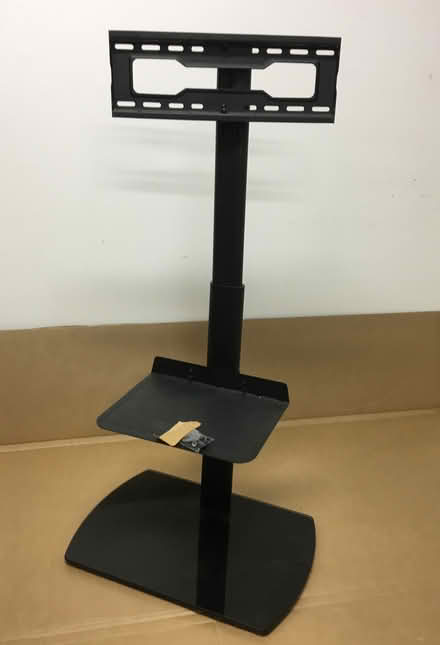 Photo of free Adjustable Height Swivel TV Stand (Foster & California Ave) #1