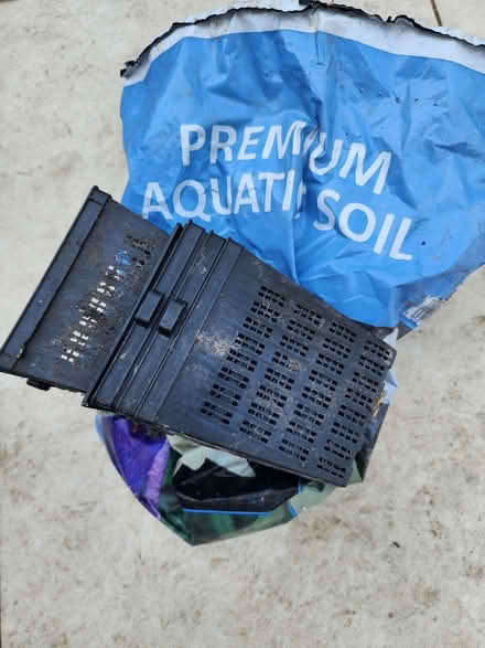 Photo of free Open bag of aquatic soil and pond plant pots (Church RG2) #1