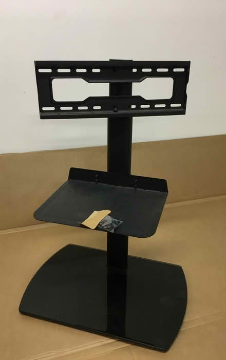 Photo of free Adjustable Height Swivel TV Stand (Foster & California Ave) #2