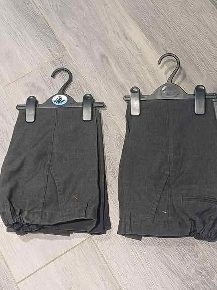 Photo of free 5 yrs school uniform grey trousers white pe top & polo tops (Haylands Way MK41) #1