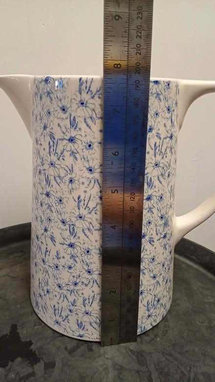Photo of free pitcher jug vase 19.5cm tall, VGC, white with blue flowers (Boscombe BH5) #1