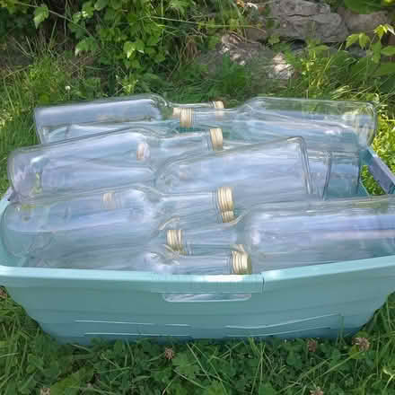 Photo of free clean glass bottles with lids (Thomastown Kilkenny) #2