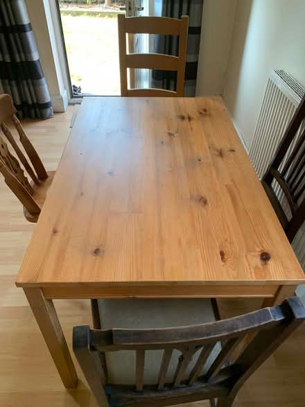 Photo of free Pine table and four mixed chairs (Belper DE56) #2