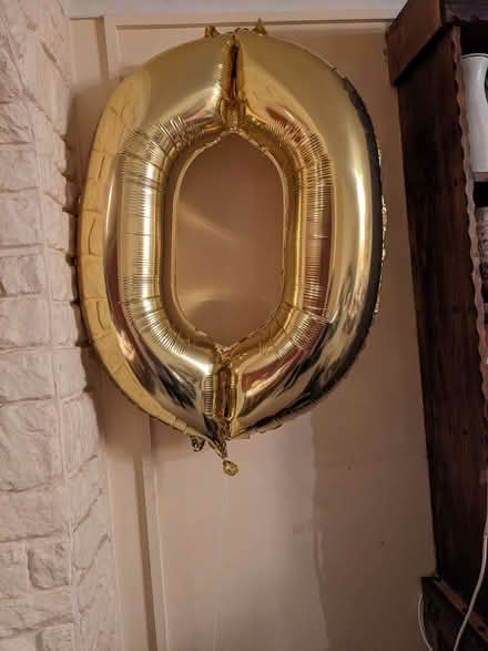 Photo of free Gold helium "0" balloon. Needs re-inflating. (Caversham Park RG4) #1