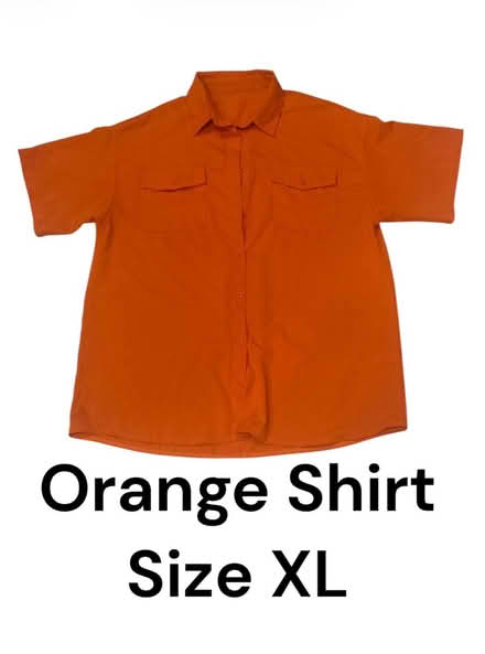 Photo of free Woman’s Orange Shirt (Brooklyn Storage) #1