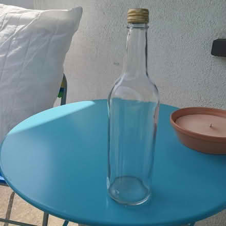 Photo of free clean glass bottles with lids (Thomastown Kilkenny) #1