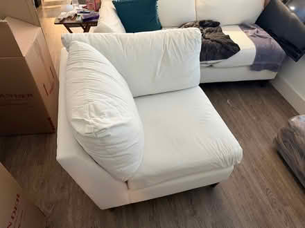 Photo of free Corner couch piece (Everleigh Apartments) #2