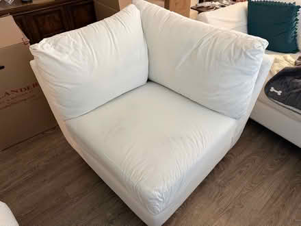 Photo of free Corner couch piece (Everleigh Apartments) #1
